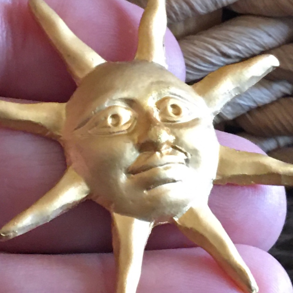 Vintage gold painted sun tac pin brooch